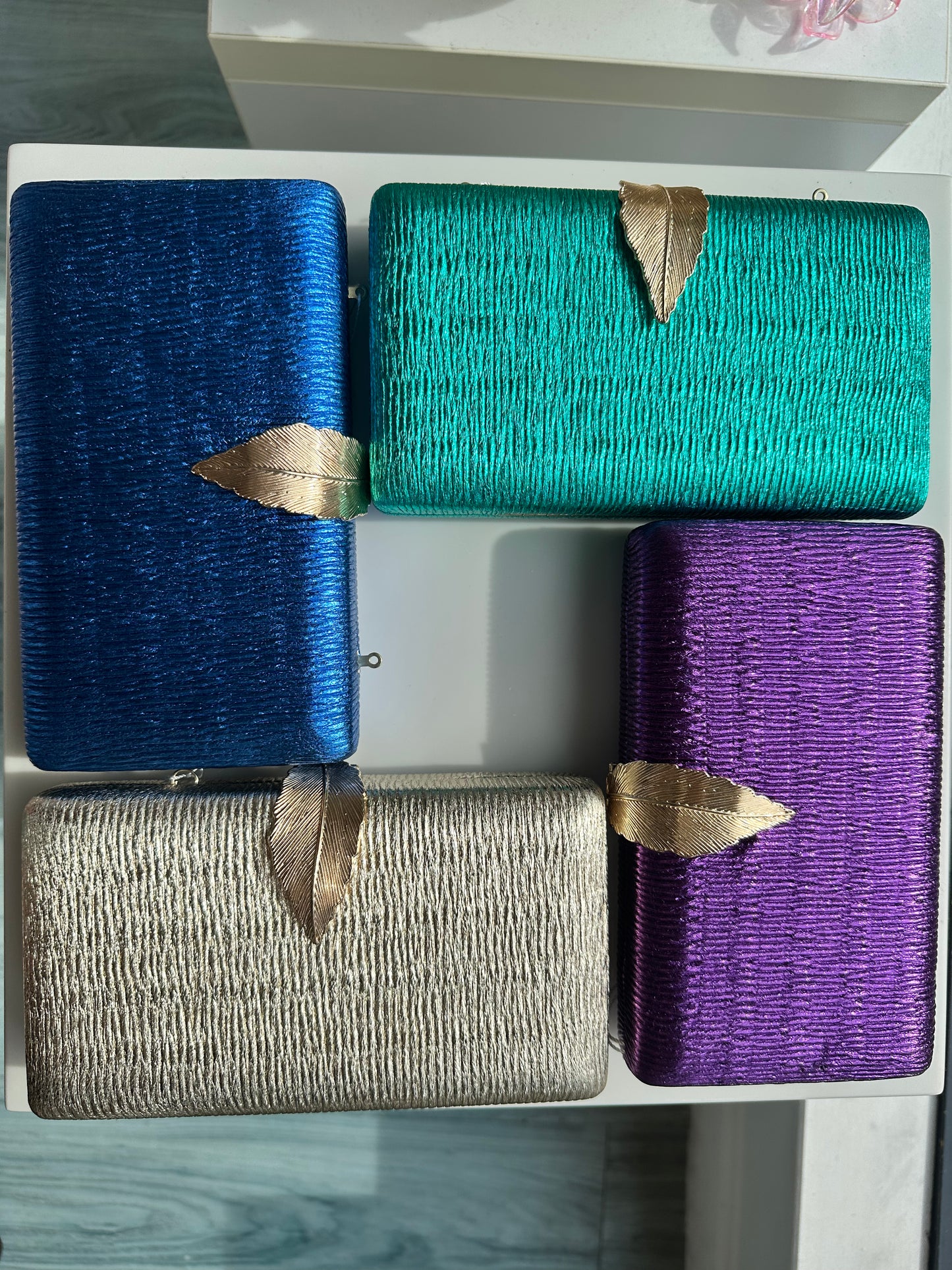 DMB Metallic Feather Clasp Clutch Bag